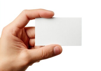 Obraz premium A hand holds a blank rectangular card, likely a business card, against a white backdrop