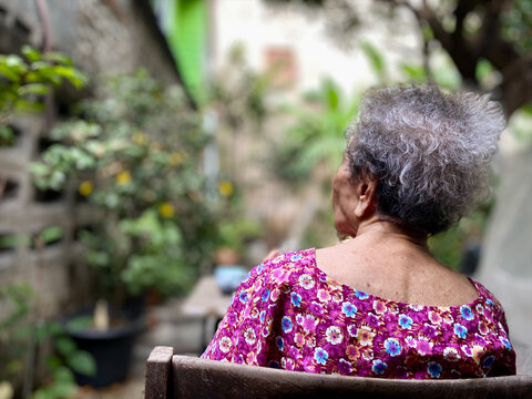 Inspiring elderly woman at 99 years old enjoying peaceful moments outdoors. A symbol of wisdom, contentment, and living life to the fullest in senior years.
