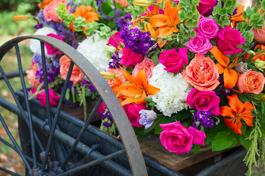 bouquet of flowers on a rustic wagon