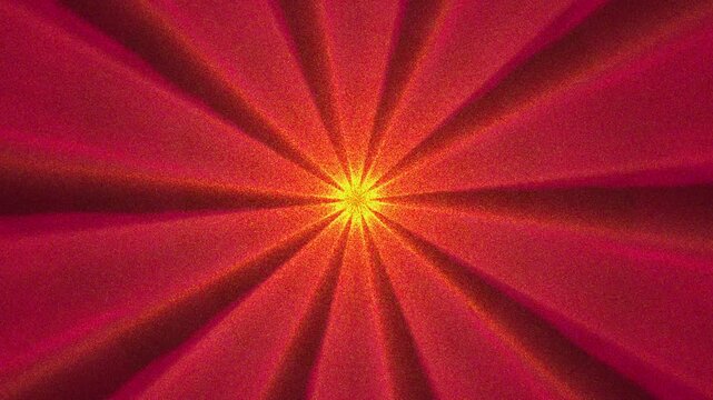 Abstract radiant burst of warm red and orange light emanating from a central point, creating a vibrant and energetic visual effect with a textured background