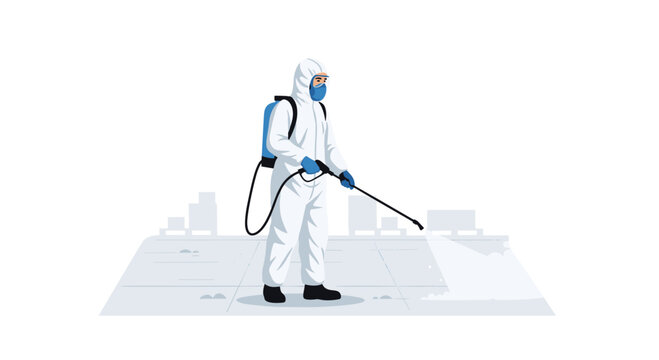 A person in a full white hazmat suit with a backpack sprayer disinfects an outdoor ground area in a grey urban environment.