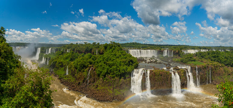 Huge panorama with Rainbow in Iguazu falls waterfalls Scenic destination