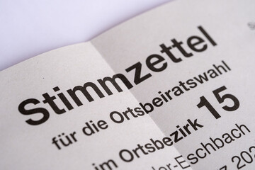 Obraz premium Hyperlocal voting documents, ballot paper for local Ortsbeirat election, civic participation municipal level, representing grassroots democracy, decentralized governance structure in modern Germany