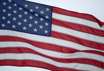 Obraz premium american flag waves gently soft morning light stars shining brightly deep blue backdrop