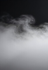 Fototapeta premium dense billowy white mist envelops deep black background dramatic