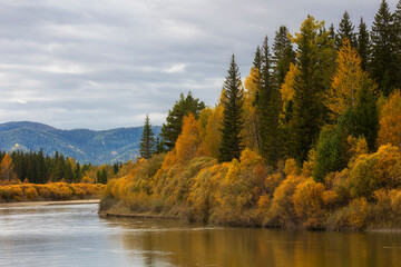 Autumn landscape with mountains and the Irkut River. Russia. Siberia