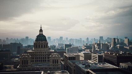 Obraz premium aerial view capitol dome skyline hazy, cinematic twilight over historic government building wide rooftop vantage captures ornate dome and dense urban grid,