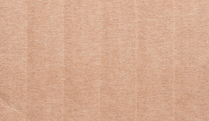 Fototapeta premium Corrugated cardboard, brown textured paper background