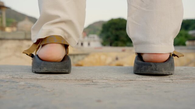 Tourist Stepping Over Camera Panna Meena Kund, Jaipur Stepwell Low Angle, Cinematic Rajasthan Travel Transition India
