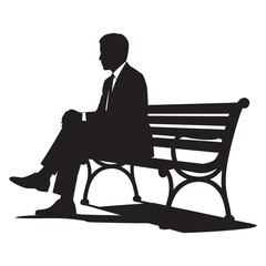 Silhouette of man sitting alone on park bench deep in thought during quiet moment