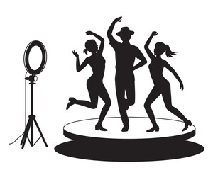 Three dancers performing on stage under ring light with dynamic poses and joyful expressions