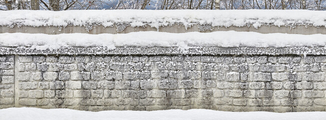 Beautiful snow-covered park wall. Version 1 and Version 2 can be combined to create a large panoramic format.
