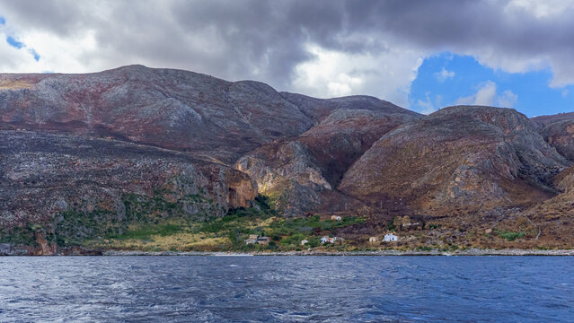 Grotta dell Uzzo Cave Entrance and the Burned Slopes of Zingaro National Park from the Sea
