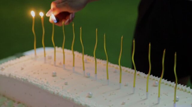 Lighting candles on the cake