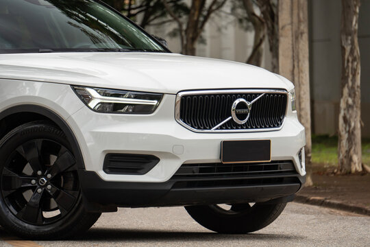White Volvo XC40 front grill and emblem close up, Luxury SUV front end details