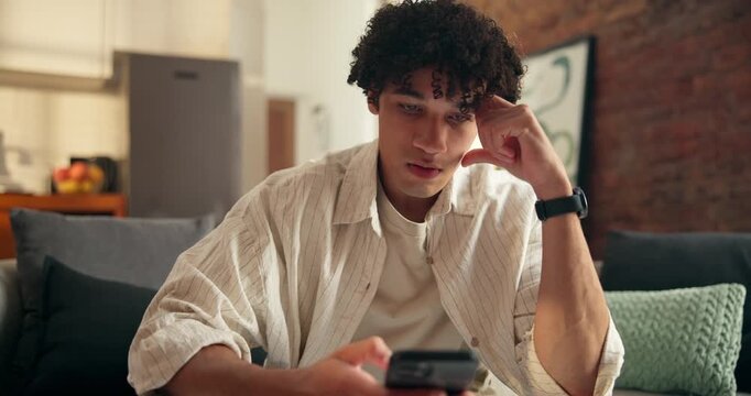 Phone, sad and man typing in home for online dating, lonely and match fail with profile mistake. Mobile, unhappy and person with depression for broken heart, frustrated and ghosted on social media