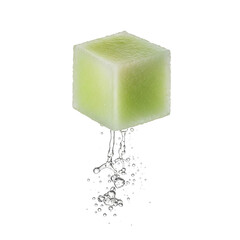 A green cube of soap melting and releasing water droplets against a black background