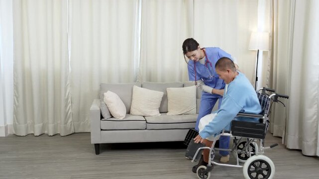 Female caregiver, aged care support helping mature women patient to recover injured leg, physiotherapy, take wheelchair for patient.