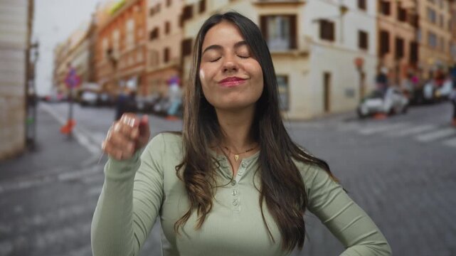 Hispanic young woman pointing finger upward on a busy urban street with smiling expression; inspiration.