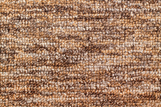 Brown carpet texture close-up. Loop Type Carpet Flooring