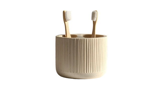 Toothbrushes in Beige Ceramic Holder.