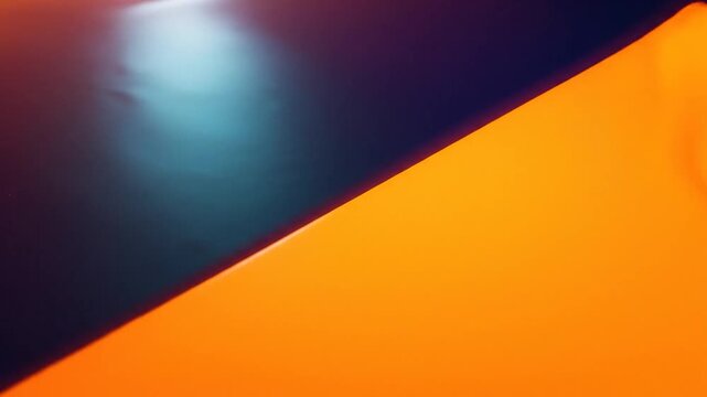 Dynamic abstract background with a diagonal split of vibrant orange and deep