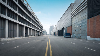 Modern Industrial Buildings with Empty Road © zhouyilu