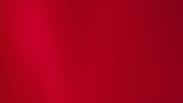 Solid red background with subtle variations, suitable for graphic design projects, web backgrounds, or abstract artistic creations. Vibrant simplicity.