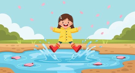 Naklejka premium Young Girl Jumping in Rain Puddle.