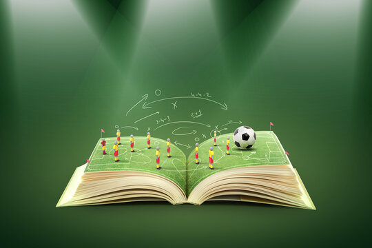 Football tactics illustrated with drawings on an open book.	