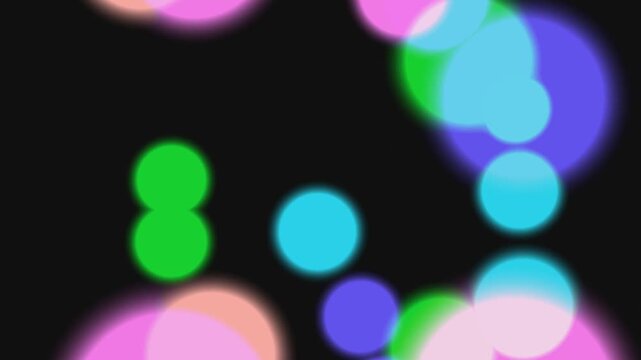 Colorful Blurred Circles on Black Background.