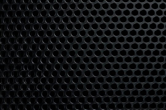 Perforated metal mesh, micro holes in black steel, speaker grille texture, tech minimal