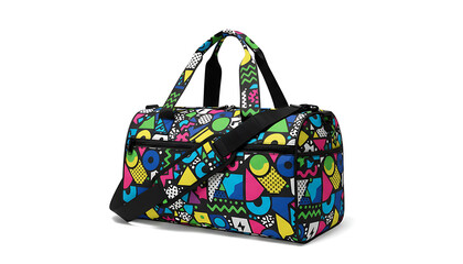 Colorful duffel bag with geometric pattern on white background isolated isolated on a transparent background