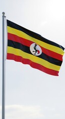 Naklejka premium Uganda Flag Waving in Clear Daylight