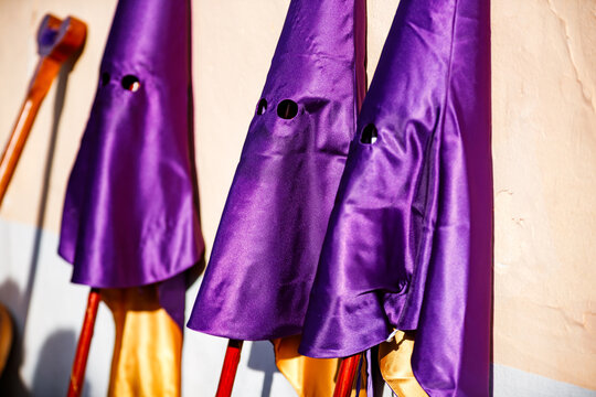 Purple Capirote Hoods Awaiting the Procession