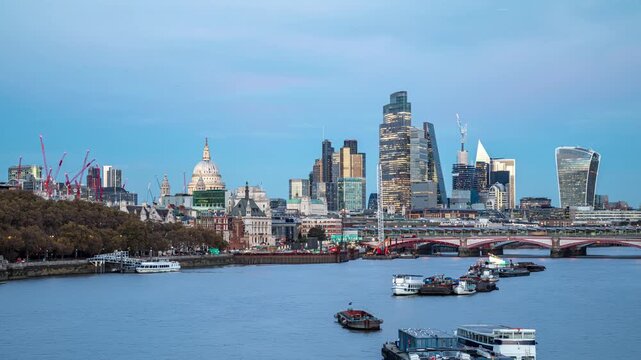 The Thames river with The City of London and the St Pauls Cathedral.
