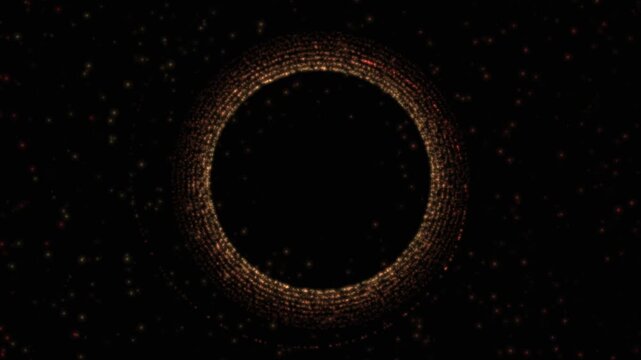 Golden ring floats amid drifting red and yellow particles