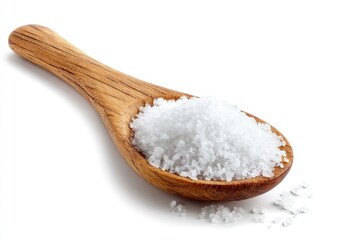 White, granular salt piles in a wooden spoon, angled against a white background