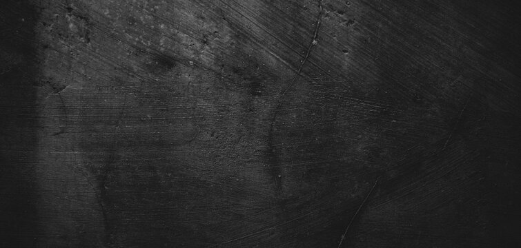 Black background of natural paintbrush stroke textured cement or stone old.Horror Cement Texture. Grunge scary background. Wall Concrete Old black