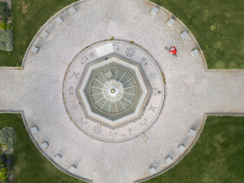 circle with fountain and person practicing sport