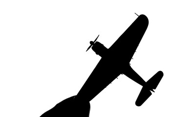 指でつままれたシルエットのプロペラ戦闘機