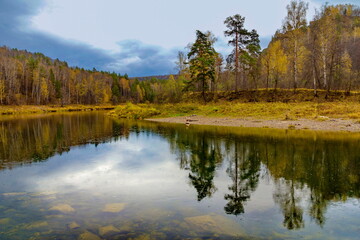 Fototapeta premium Magnificent landscape of the Ural river Belaya with rocky banks on an autumn day