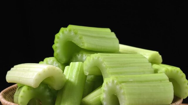 Chopped green celery in a small basket