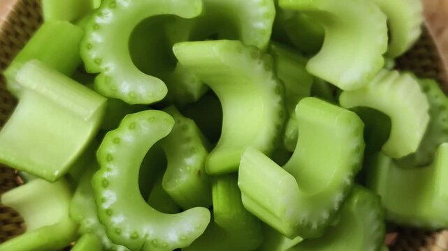 Chopped green celery in a small basket