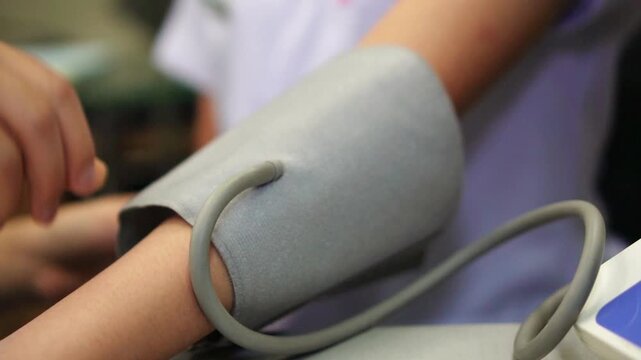 Blood Pressure Measurement Cuff Application &ndash; Slow Motion
