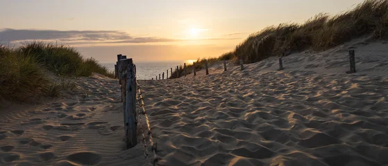 Handdoek met foto Noordzee View of sunset over the North Sea from a path on the edge of the dune in Zandvoort, Netherlands  © Matt A. Hawk