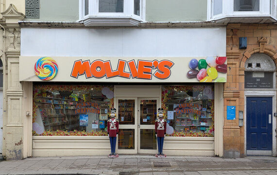 The front entrance to a Mollie's sweet shop in Aberystwyth, Ceredigion, Wales, UK.