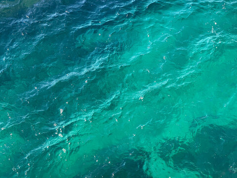 Seawater blue clear sea waves background.