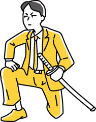 刀を携えて構える男性社員