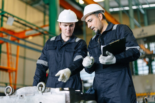 Engineer worker team service injection mold, Professional men work in die casting plant mold service